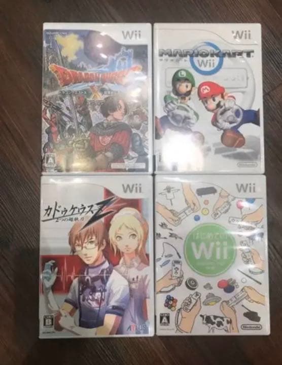 Wii本体 ソフト4本 マリオカート専用コントローラー2つ付